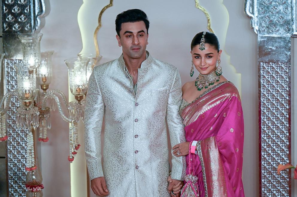 PHOTO: Bollywood actor Ranbir Kapoor (L) with his wife and actress Alia Bhatt attend the wedding ceremony of billionaire tycoon and Chairman of Reliance Industries Mukesh Ambani's son Anant Ambani and Radhika Merchant, in Mumbai, on July 12, 2024.