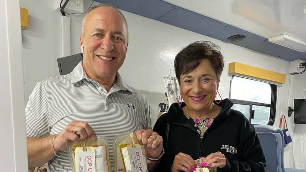 PHOTO: Brian and Dina Murphy pose for a photo with their plasma donations in hand.