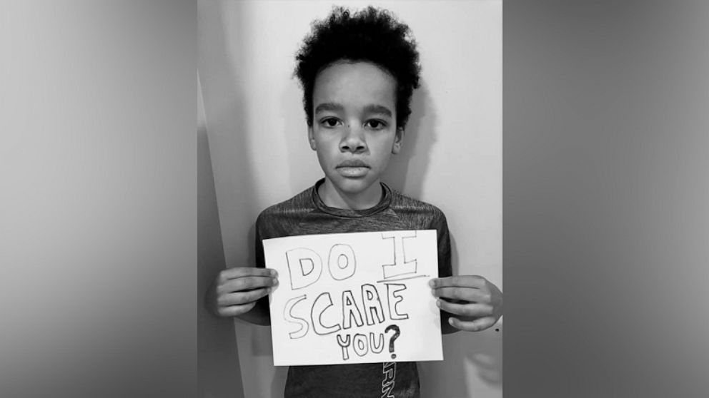 PHOTO: Mitchell Musvosvi, 10, poses with a sign he made amid protests in support of the Black Lives Matter movement.