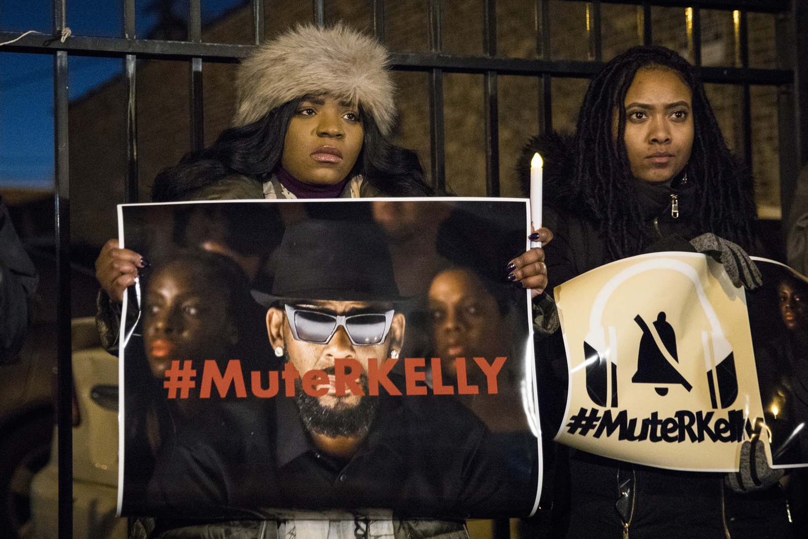 PHOTO: #MuteRKelly supporters protest outside R. Kelly's studio, Wednesday, Jan. 9, 2019 in Chicago. Lifetime's "Surviving R. Kelly" series which aired earlier this month, looks at the singer's history and allegations that he has sexually abused women.
