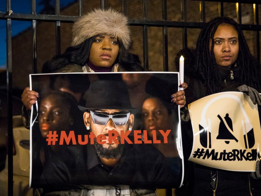 PHOTO: #MuteRKelly supporters protest outside R. Kellys studio, Wednesday, Jan. 9, 2019 in Chicago. Lifetimes Surviving R. Kelly series which aired earlier this month, looks at the singers history and allegations that he has sexually abused women.