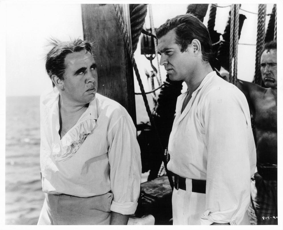 PHOTO: Charles Laughton and Clark Gable standing on deck in a scene from the film "Mutiny On The Bounty,", 1935. 