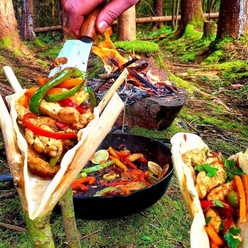 Cooking on a campfire in nature, cooking on a campfire in the campaign.  Camp kitchen, cooking