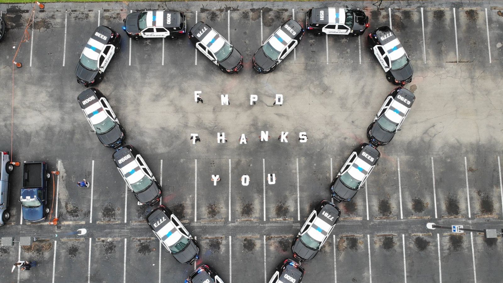 PHOTO: Fort Myers Police Department arranged their police cruisers in the shape of a heart outside Lee Memorial Hospital in Fort Myers, Fla.