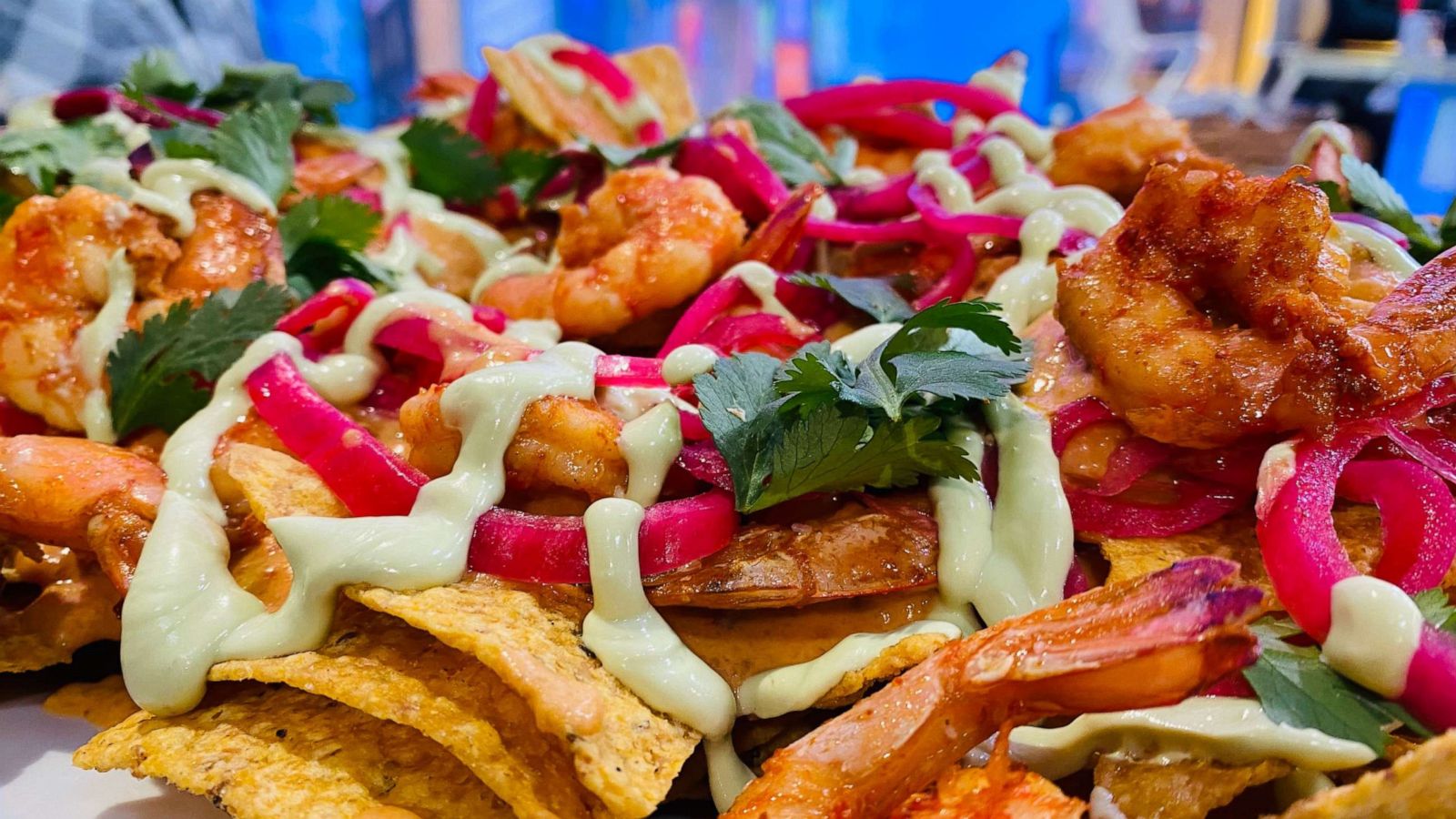 PHOTO: Dale Talde's spicy shrimp nachos with bacon and smoked chili queso.