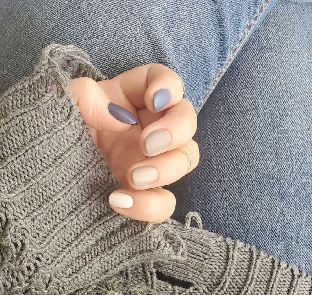 PHOTO: International celebrity nail artist Tracylee Percival creates tonal nails using blue and nude nail polish colors.