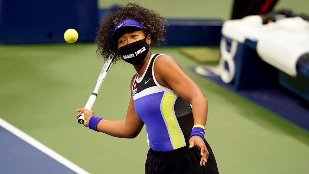 PHOTO: Naomi Osaka, of Japan, wears a mask in honor of Breonna Taylor as she celebrates after defeating Misaki Doi, of Japan, during the first round of the US Open tennis championships, Aug. 31, 2020, in New York.