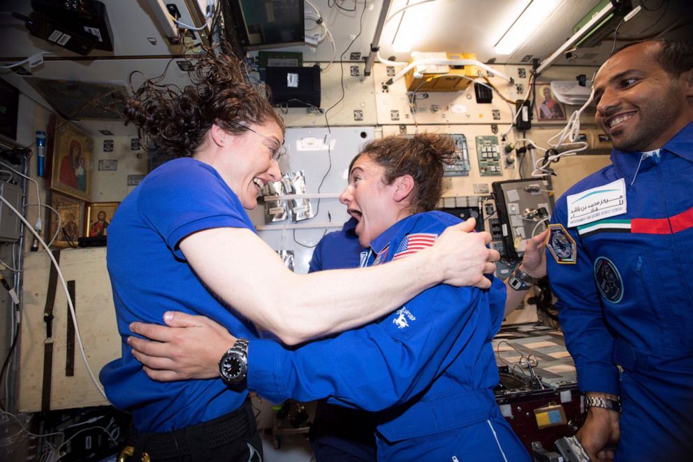 PHOTO: Christina H. Koch and Jessica Meir greet each other after Meir's arrival on the International Space Station, Sept. 4, 2019.