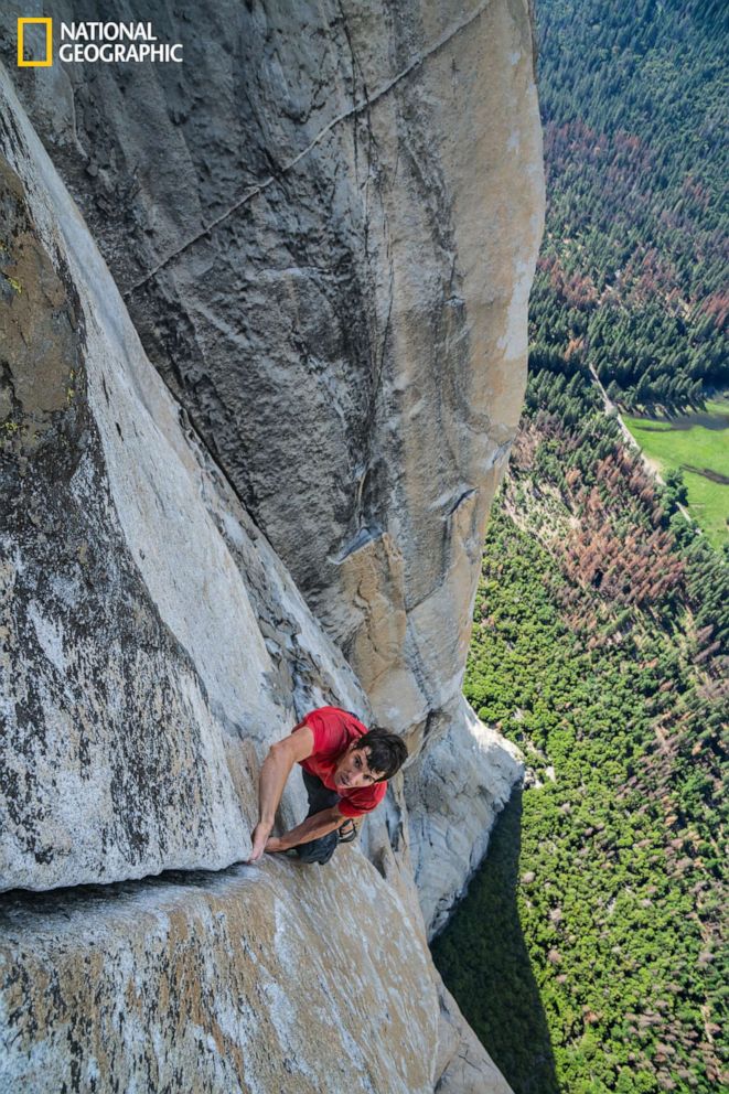 PHOTO: With California's Yosemite Valley far beneath him, Alex Honnold free solos—which means climbing without ropes or safety gear—up a crack on the 3,000-foot southwest face of El Capitan.
