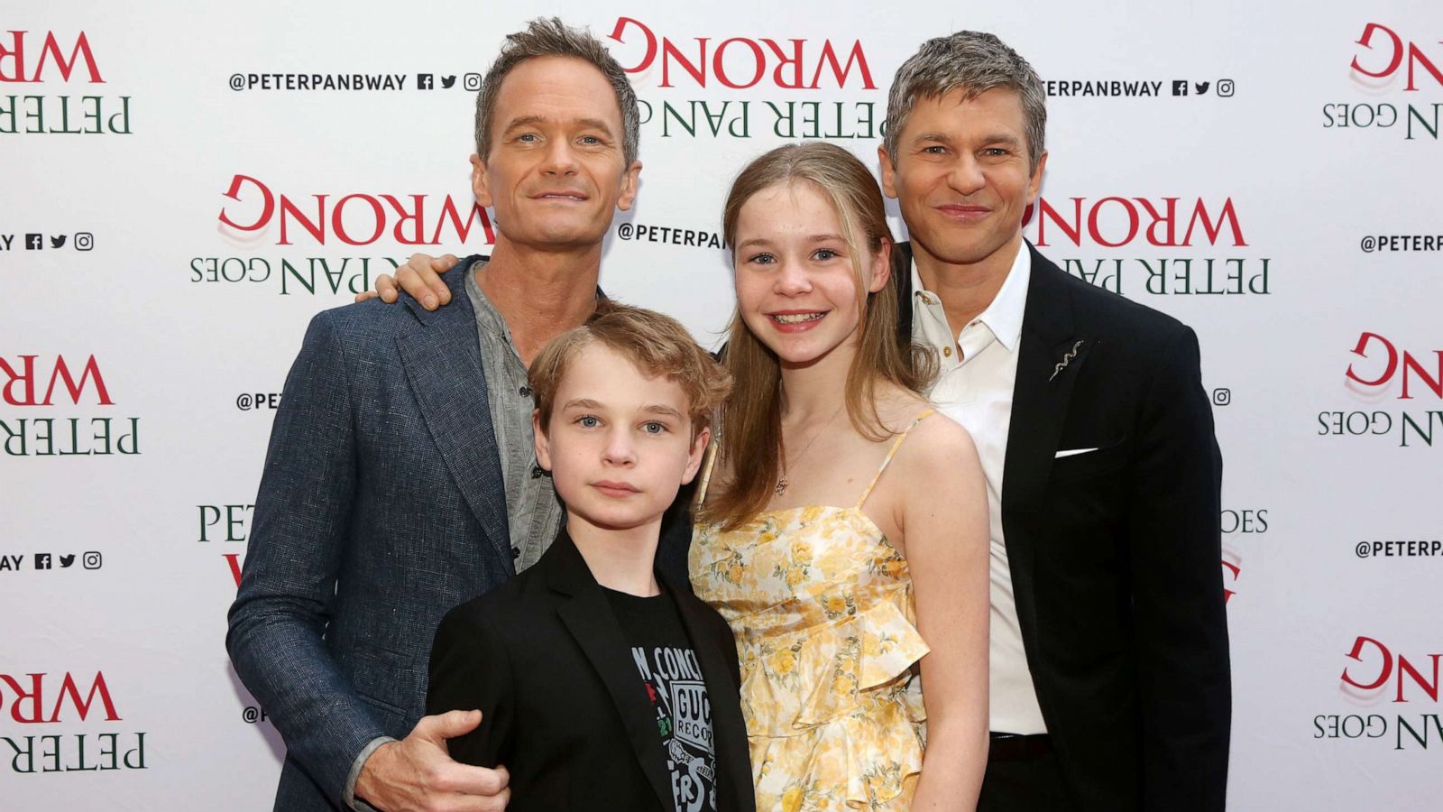 PHOTO: (L-R) Neil Patrick Harris, Gideon Burtka-Harris, Harper Burtka-Harris and David Burtka pose at the opening night of "Peter Pan Goes Wrong" on Broadway at The Ethel Barrymore Theatre, April 19, 2023, in New York City.