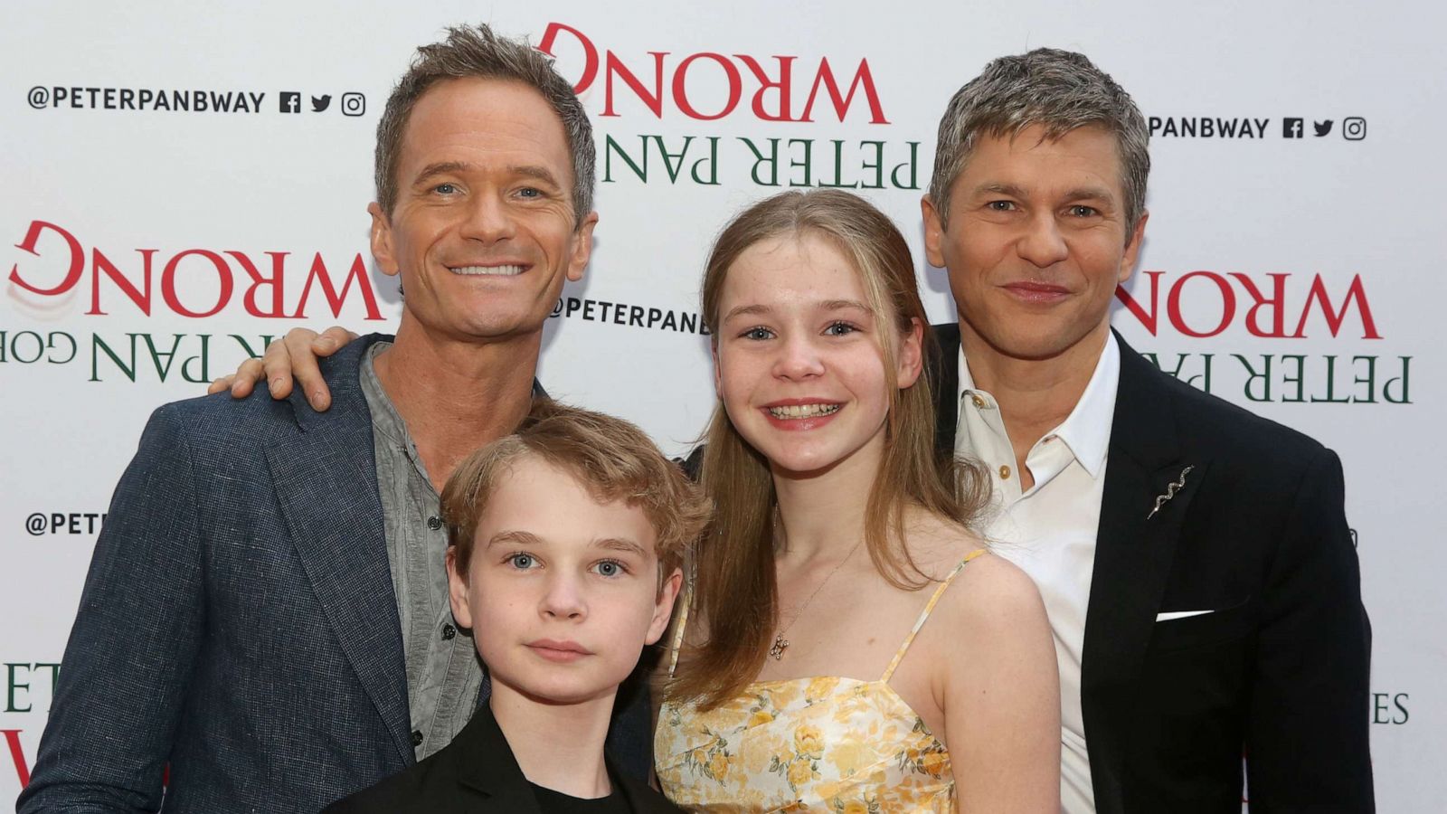 PHOTO: (L-R) Neil Patrick Harris, Gideon Burtka-Harris, Harper Burtka-Harris and David Burtka pose at the opening night of "Peter Pan Goes Wrong" on Broadway at The Ethel Barrymore Theatre, April 19, 2023, in New York.