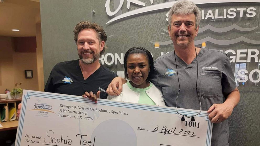 Beloved dental specialist surprised with 20K for 20 years at work