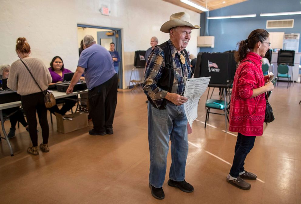 PHOTO: Paul Klopfer, holds his ballot at a polling center, Nov. 8, 2022, Albuquerque, N.M.