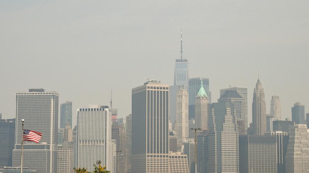 PHOTO: The Lower Manhattan skyline is pictured as wildfire smoke from Canada causes hazy conditions, in New York, on July 15, 2026.