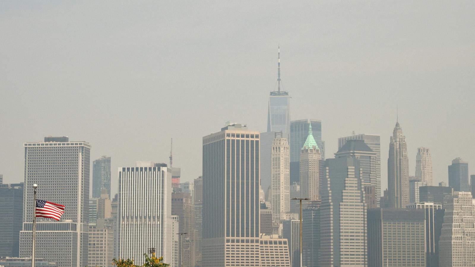 PHOTO: The Lower Manhattan skyline is pictured as wildfire smoke from Canada causes hazy conditions, in New York, on July 15, 2026.