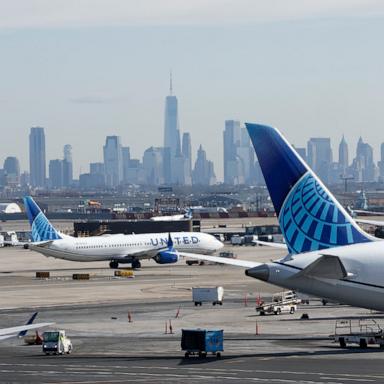 PHOTO: Airplanes sit parked at gates while others proceed to a runway at Newark Liberty International Airport, Feb. 20, 2025, in Newark, New Jersey.