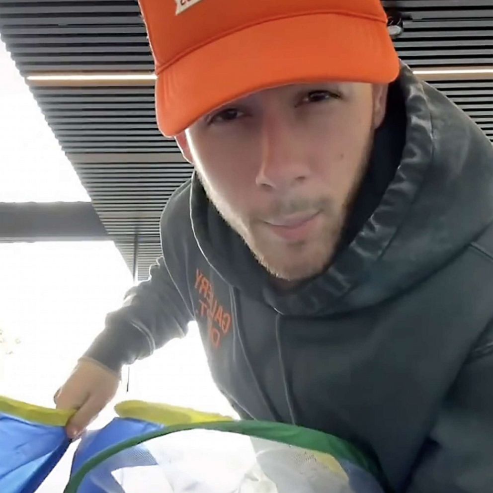 VIDEO: Watch Nick Jonas attempt to fold up a ball pit for his daughter