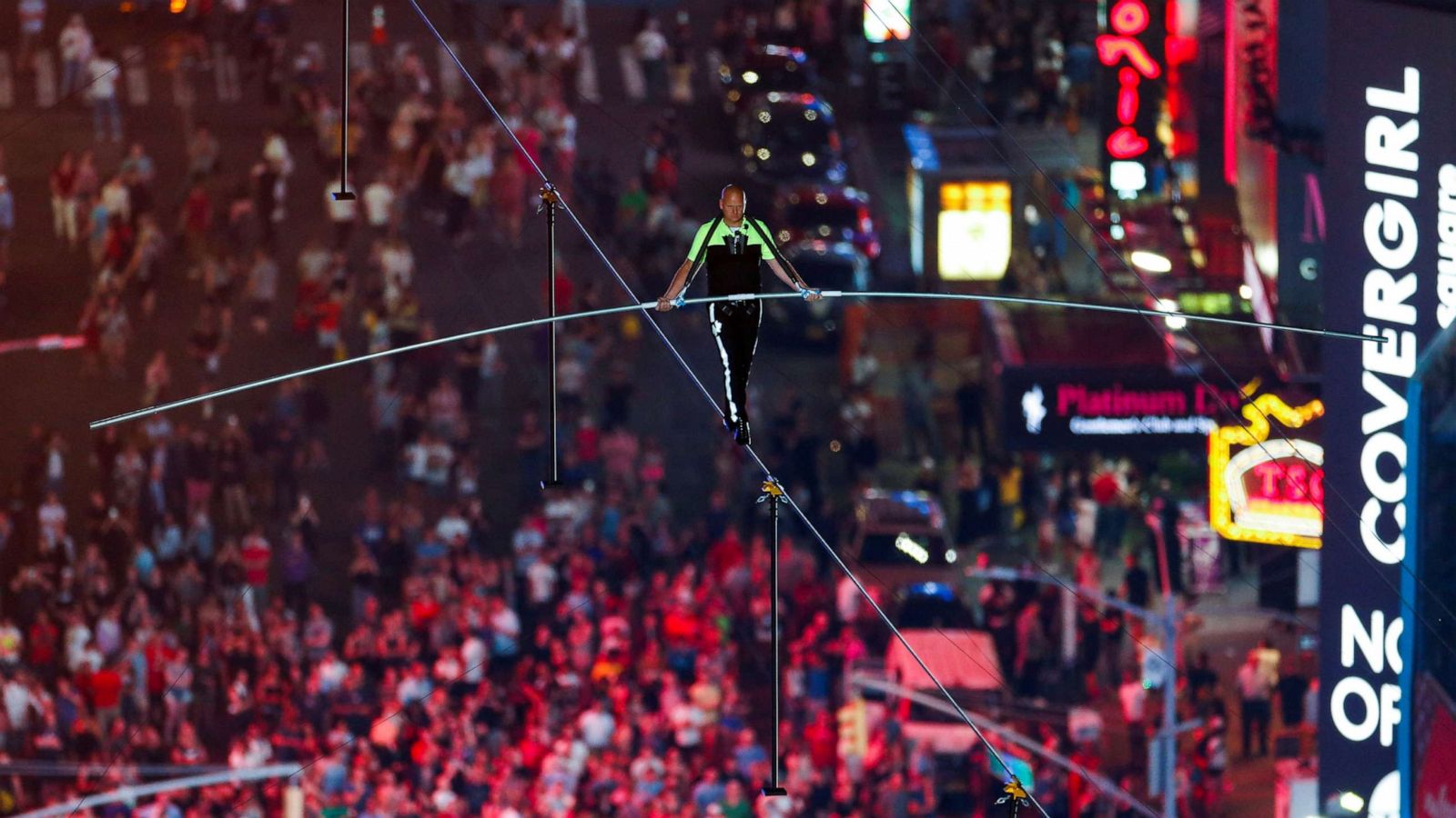 PHOTO: Nik Wallenda walks the highwire over Times Square in N.Y., June 23, 2019.