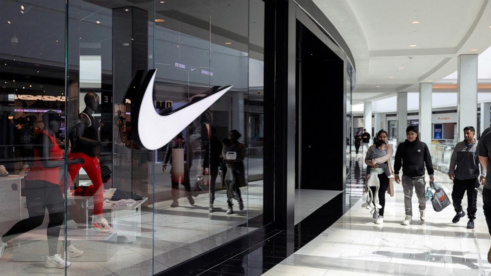 PHOTO: Shoppers walk past a Nike store in the King of Prussia Mall in King of Prussia, Pennsylvania, April 3, 2025.