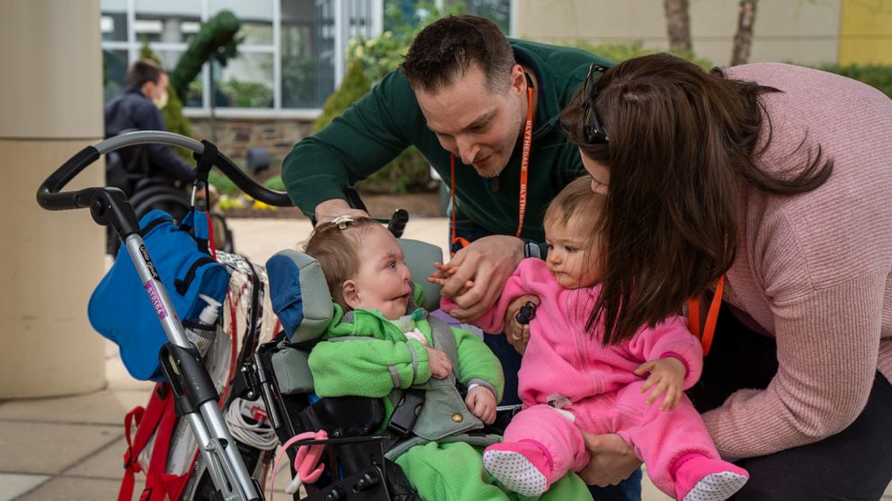 PHOTO: Eleven-month-old twin sisters Nina and Emma, pictured with their parents Dan and Marija Sparano, met for the first time at at Blythedale Children's Hospital in Valhalla, New York, Monday.
