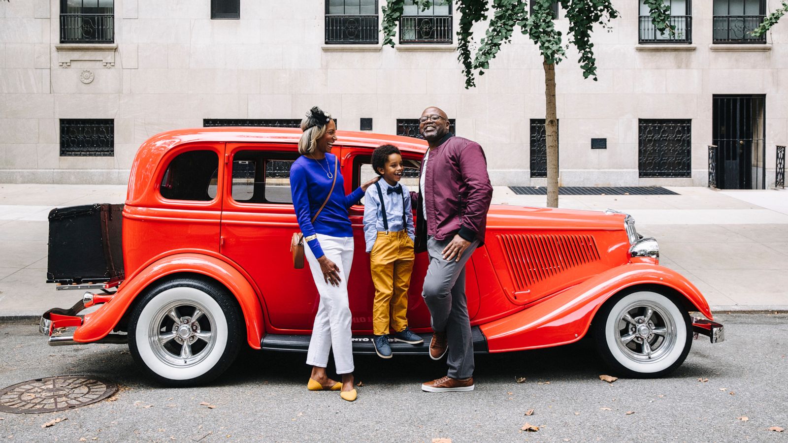 PHOTO: Family in front of a Nowaday car.