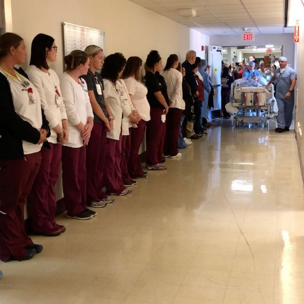 VIDEO: Over 100 hospital employees line halls to honor late nurse who became an organ donor 