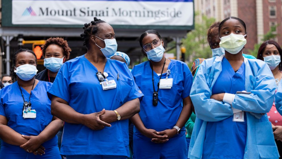 PHOTO: Medical workers gather outside Mount Sinai Morningside Hospital June 2 to support protesters demanding action in wake of George Floyd's death.