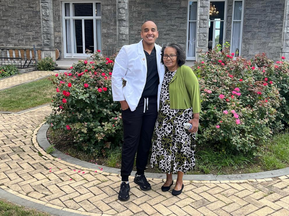 PHOTO: Abel Mezemer with his mother Asmeret Mengistu.