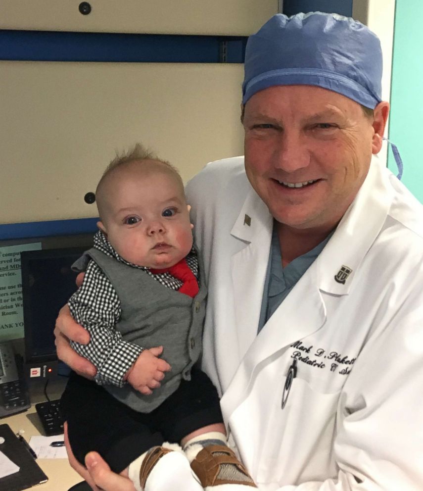 Baby Blaze is photographed with Dr. Mark Plunkett who performed heart surgery on him at OSF Children's Hospital of Illinois.