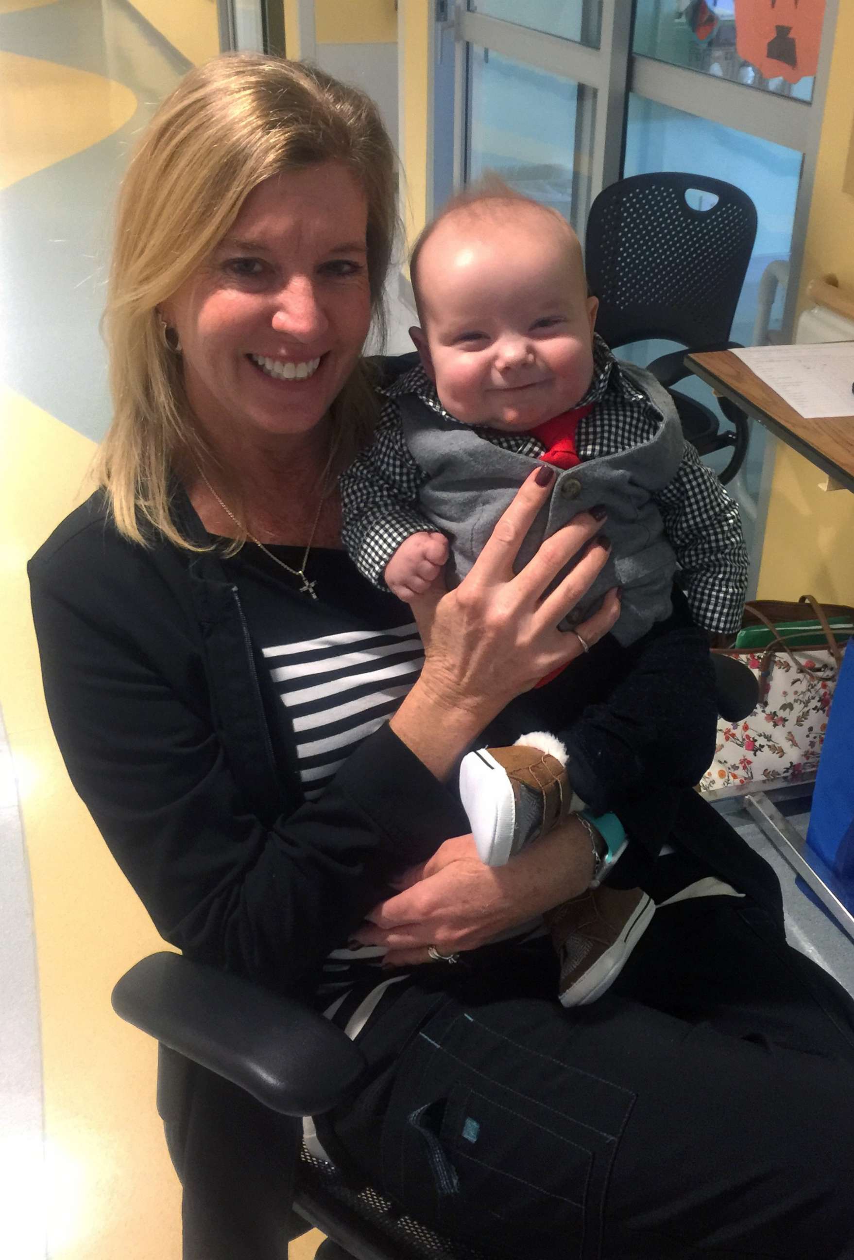 PHOTO: Angela Farnan, a primary charge nurse in the pediatric intensive care unit at OSF Children's Hospital of Illinois, adopted her son Blaze, 1, after caring for him in the ICU.