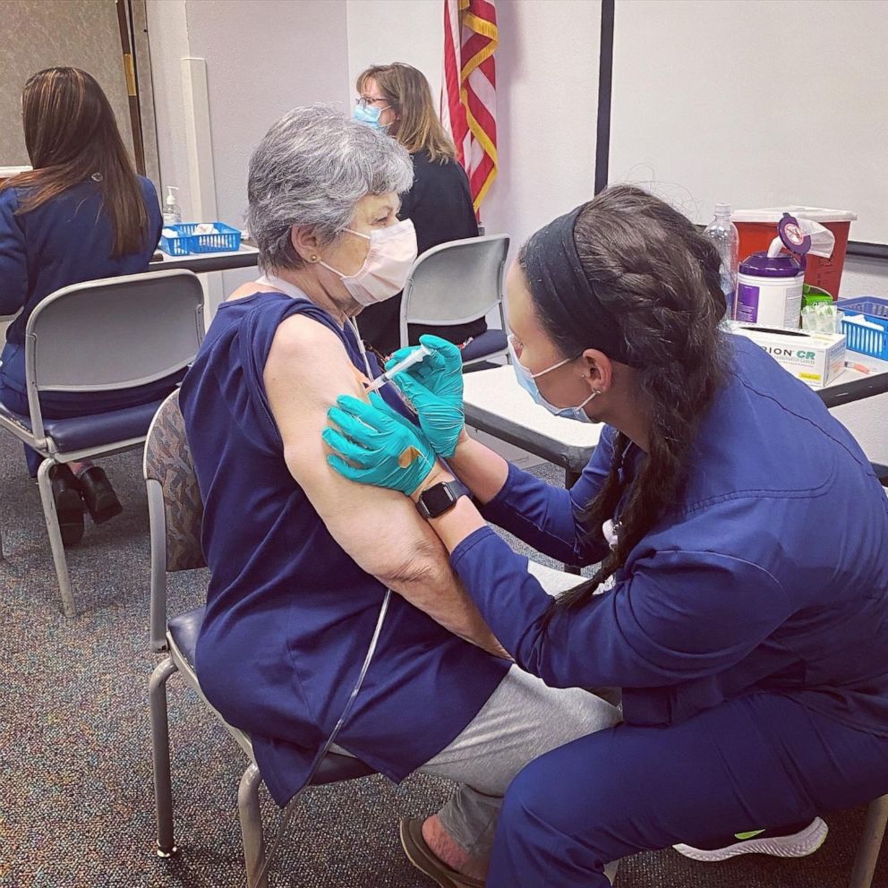 PHOTO: Megan Patterson, 32, is a nurse at Bayfront Health St. Petersburg in Florida. Patterson gave the first and second COVID-19 vaccine to her maternal grandmother, Connie Dunaway, 80.