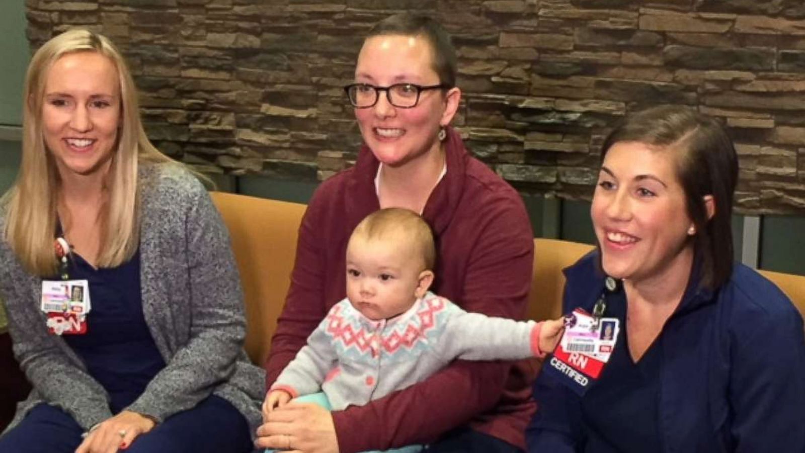 PHOTO: Kata Carter, center, and her daughter, Rosie, sit with Abby Black, left, and Katie Hanover.