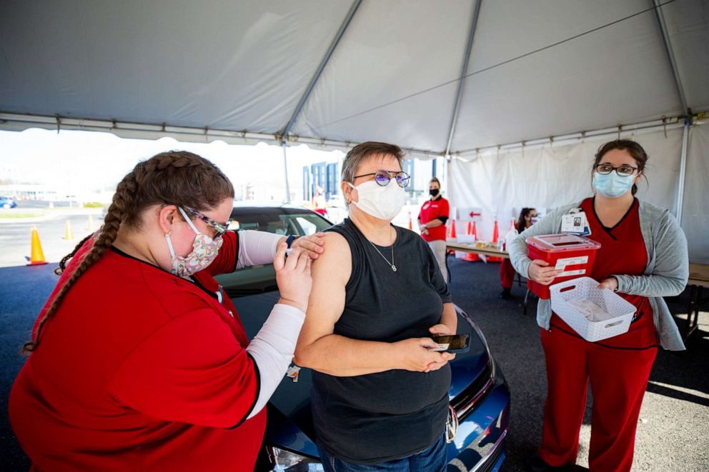 PHOTO: Dominique Brockman, 32, attends Austin Peay State University in Clarksville, Tennessee. On March 4, roughly one year after the start of the pandemic, Dominique administered the COVID-19 vaccine to her mom, Beatrix Brockman.