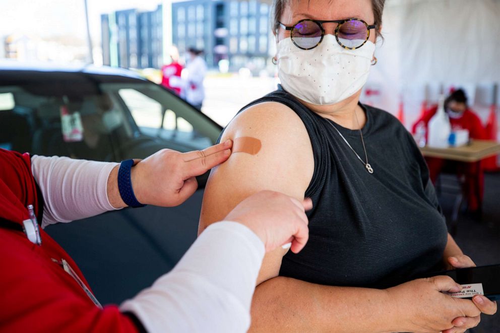 PHOTO: On March 4, roughly one year after the start of the pandemic, Dominique Brockman administered the COVID-19 vaccine to her mom, Beatrix Brockman, who is a languages and literature professor at Austin Peay State University in Clarksville, Tennessee.