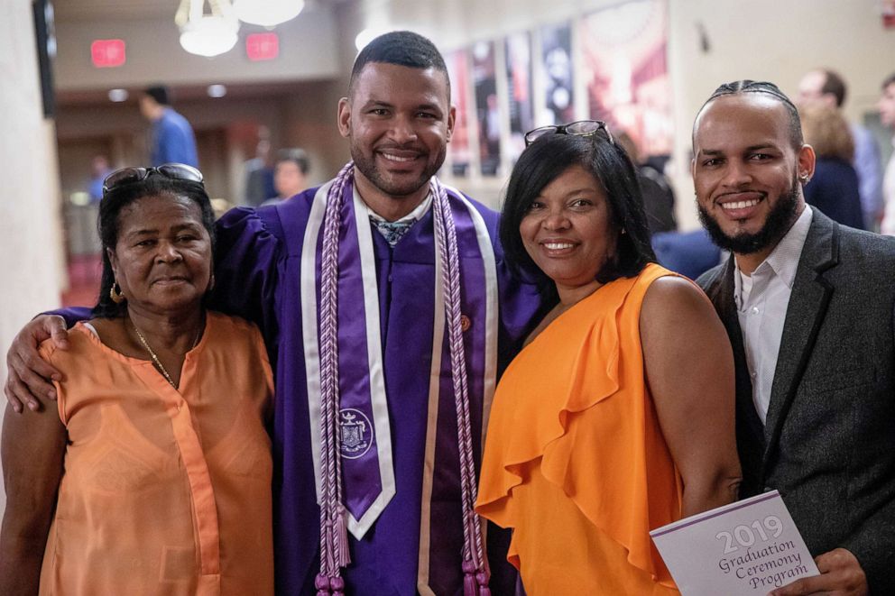 PHOTO: Frank Baez poses with his family after graduating from NYU Rory Meyers College of Nursing, May 20, 2019.