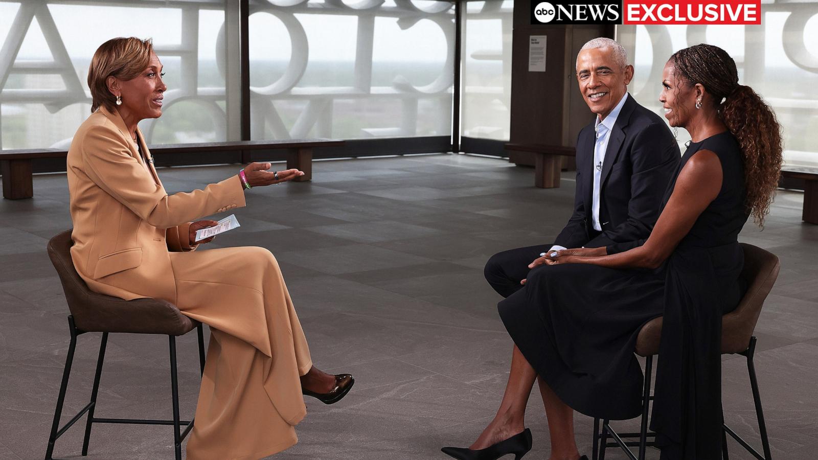 PHOTO: Former president Barack Obama and first lady Michelle Obama speak with "Good Morning America" co-anchor Robin Roberts at the Obama Presidential Center on June 13, 2026.