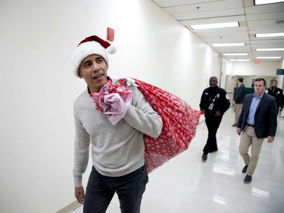 PHOTO: Former President Barack Obama visited children and families at the Childrens National hospital in Washington, D.C., Dec. 19, 2018, to drop off some Christmas gifts.