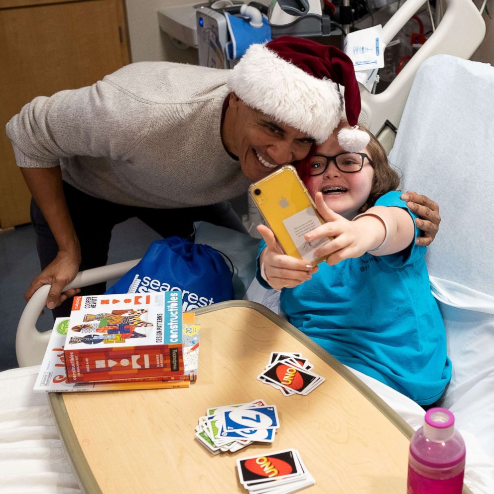 PHOTO: Former President Barack Obama visited children and families at the Children's National hospital in Washington, D.C., Dec. 19, 2018, to drop off some Christmas gifts.
