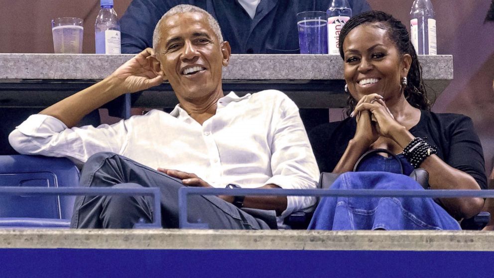 PHOTO: Former President Barack Obama (L) and his wife former First Lady Michelle Obama (R) attend the US Open tennis tournament women's singles first round match between USA's Gauff and Germany's Siegemund in New York City, on Aug. 28, 2023.
