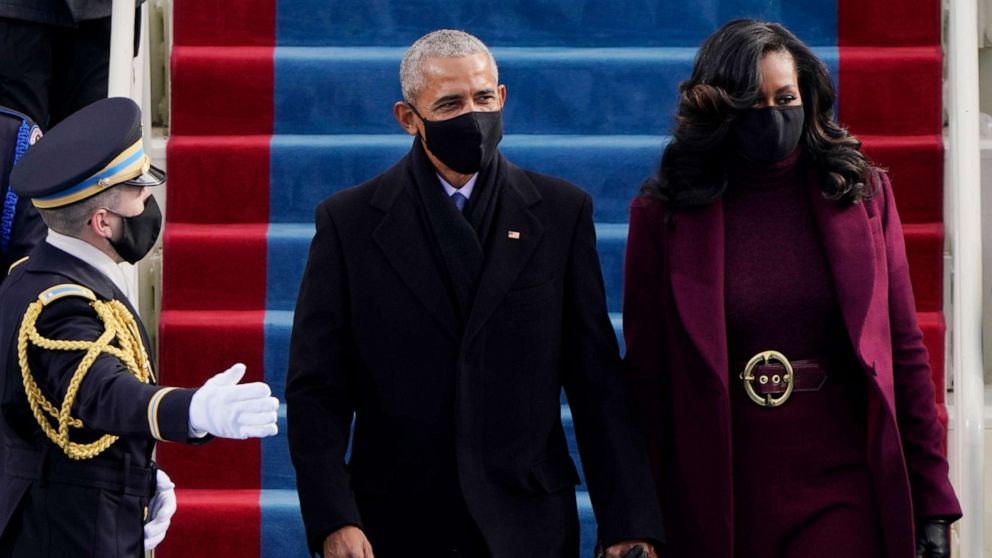 PHOTO: Former President Barack Obama and his wife Michelle arrive for the 59th inaugural ceremony on the West Front of the Capitol, Jan. 20, 2021 in Washington, D.C. 