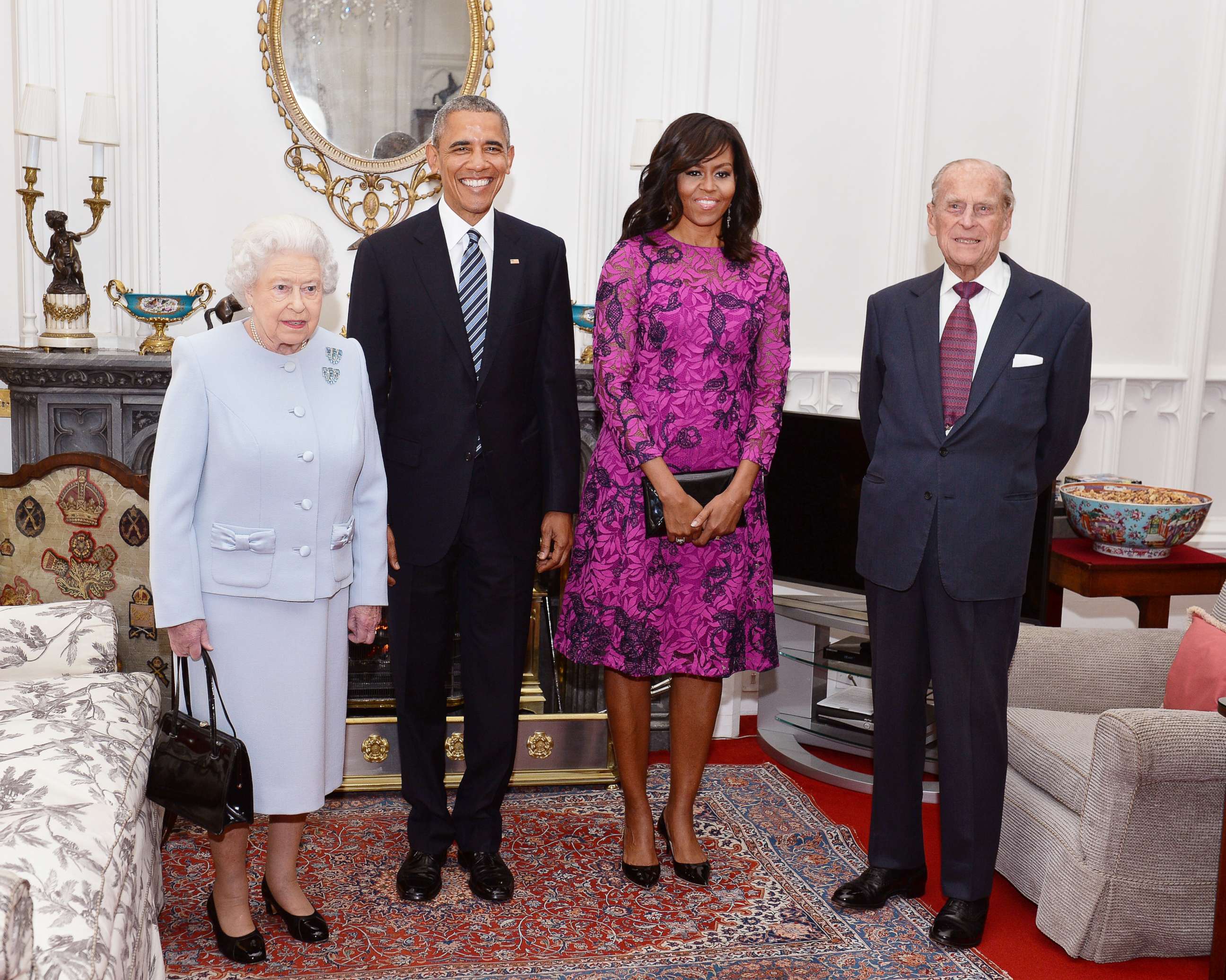 PHOTO: Queen Elizabeth II and Prince Philip, Duke of Edinburgh, stand with President Barack Obama and first lady Michelle Obama in the Oak Room at Windsor Castle on April 22, 2016 in Windsor, England.