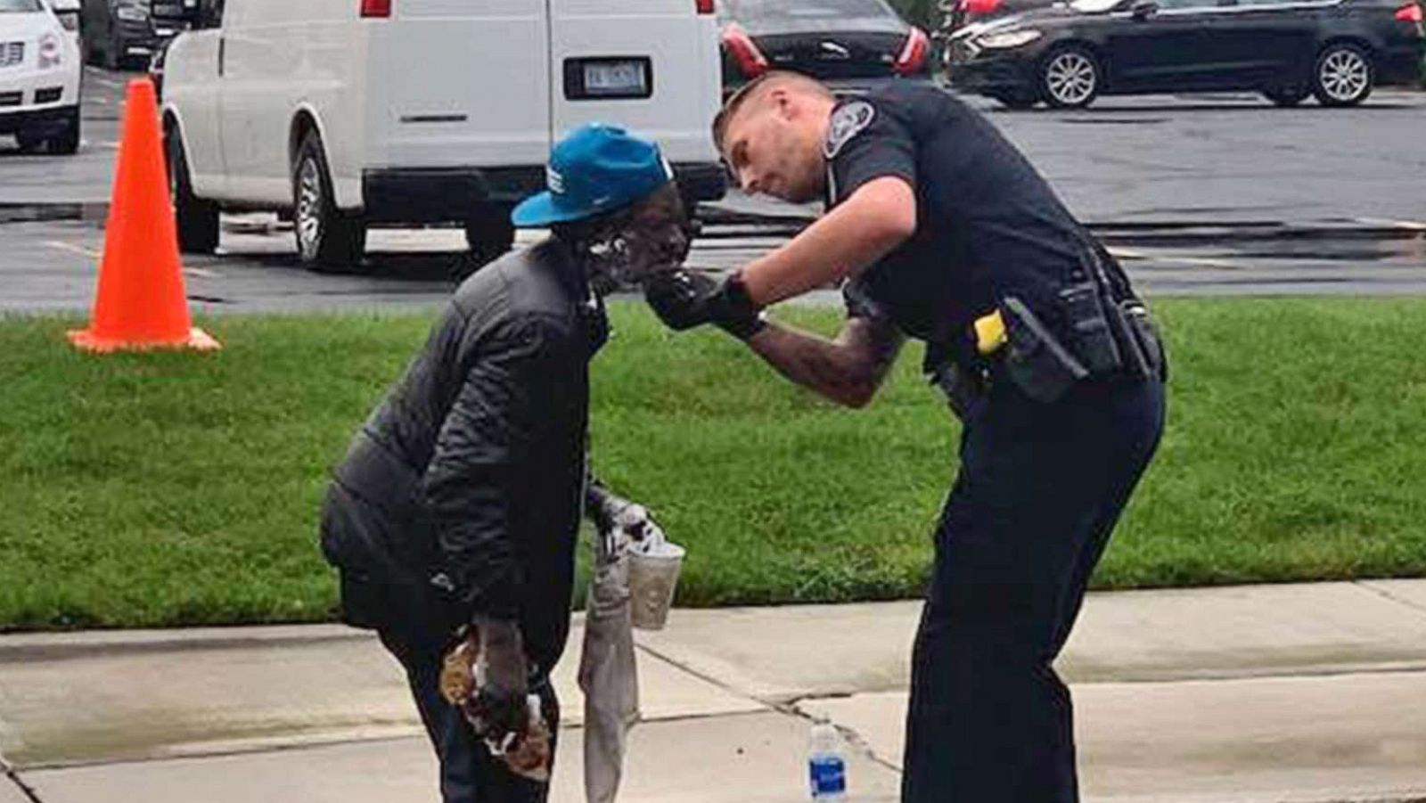 PHOTO: Officer Jeremy Thomas of the Detroit Police Department, assists Stanley Nelson, 62, with shaving his face in Detroit, in a photo shared by Jill Metiva Schafer on social media, Sept. 11, 2019.