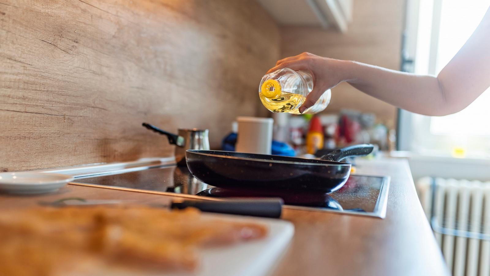 PHOTO: Stock photo of a person cooking in the kitchen.