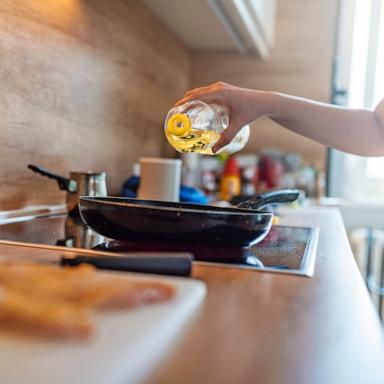 PHOTO: Stock photo of a person cooking in the kitchen.