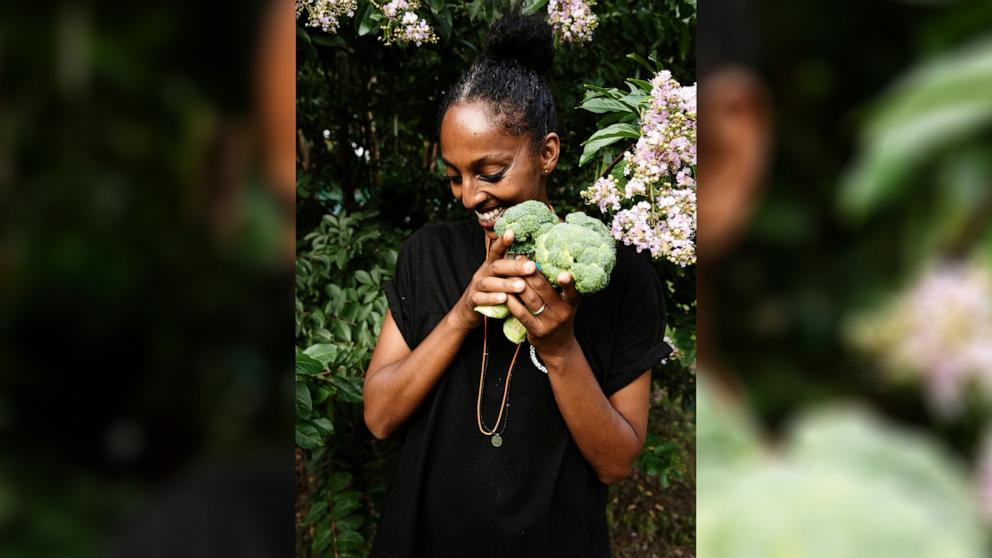 PHOTO: Asmeret Berhe-Lumax, the founder and CEO of One Love Community Fridge at one of the free food fridges in Brooklyn, N.Y.