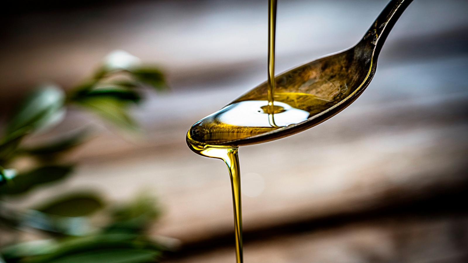 PHOTO: Pouring extra virgin olive oil on a spoon in an undated stock photo.