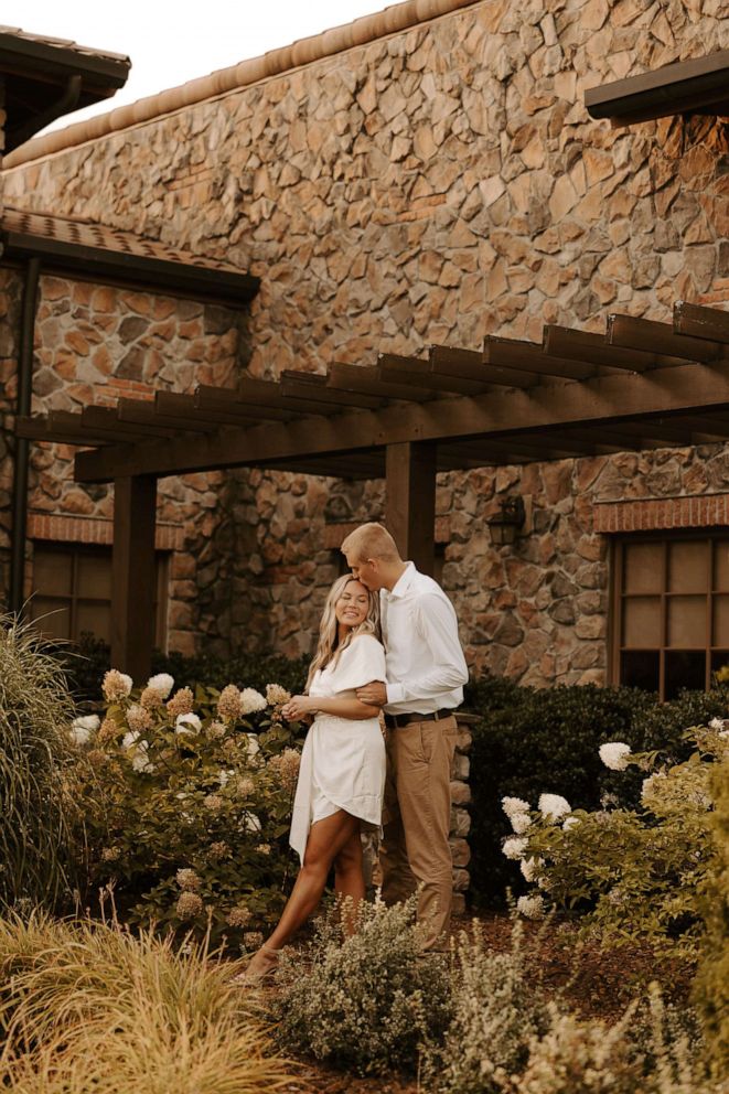 PHOTO: Carlsey Bibb and Caden Mills pose at Olive Garden for their engagement photos, which have gone viral.