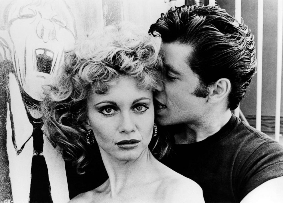 PHOTO: Olivia Newton-John, alongside John Travolta, pose in a film still from "Grease," released in 1978. 