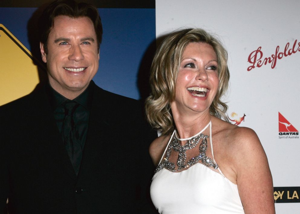 PHOTO: John Travolta, left, and Olivia Newton-John arrive at the The Penfolds Icon Gala Dinner in Los Angeles on Jan. 14, 2006.