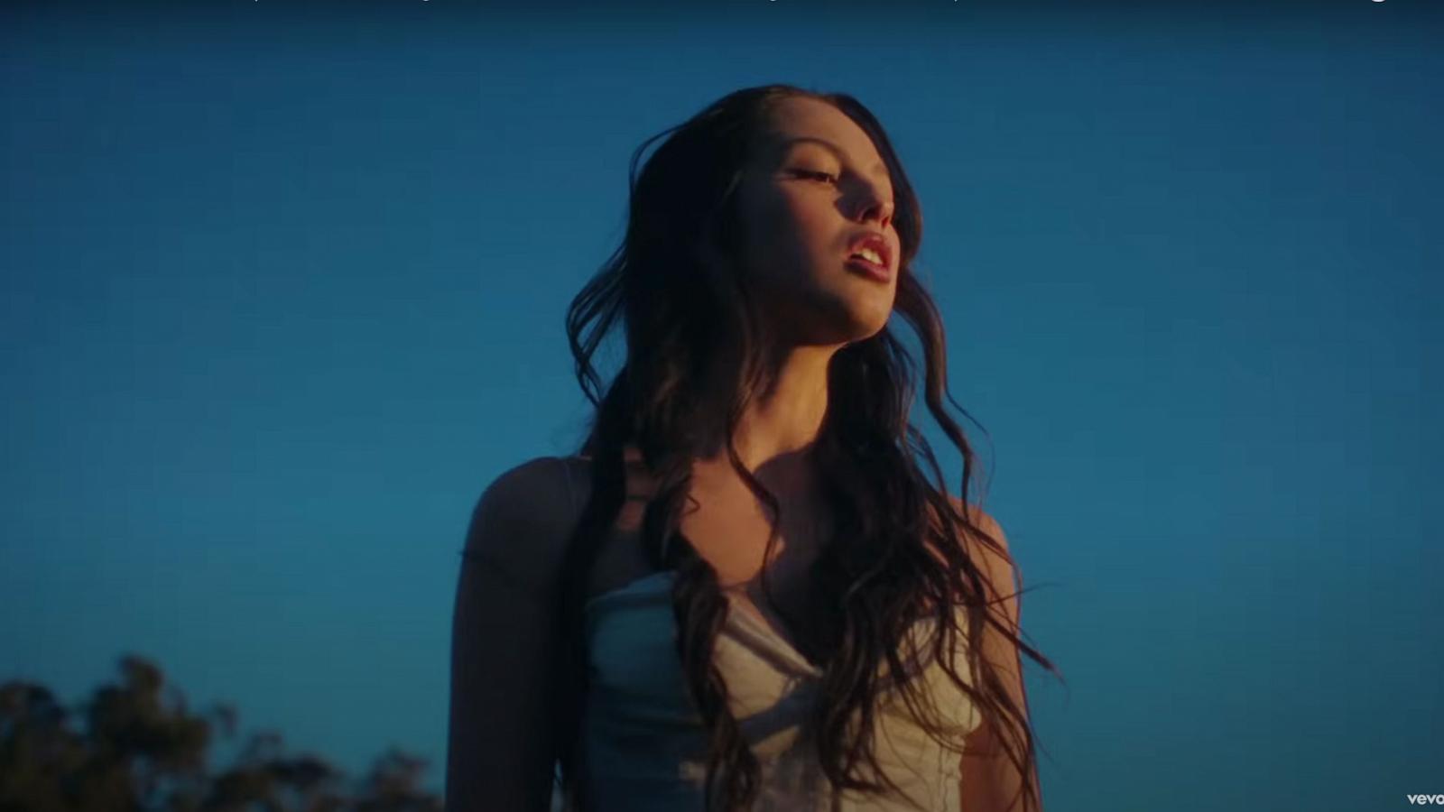 PHOTO: Olivia Rodrigo appears in the official music video for her new track, "Can’t Catch Me Now" from "The Hunger Games: The Ballad of Songbirds & Snakes."